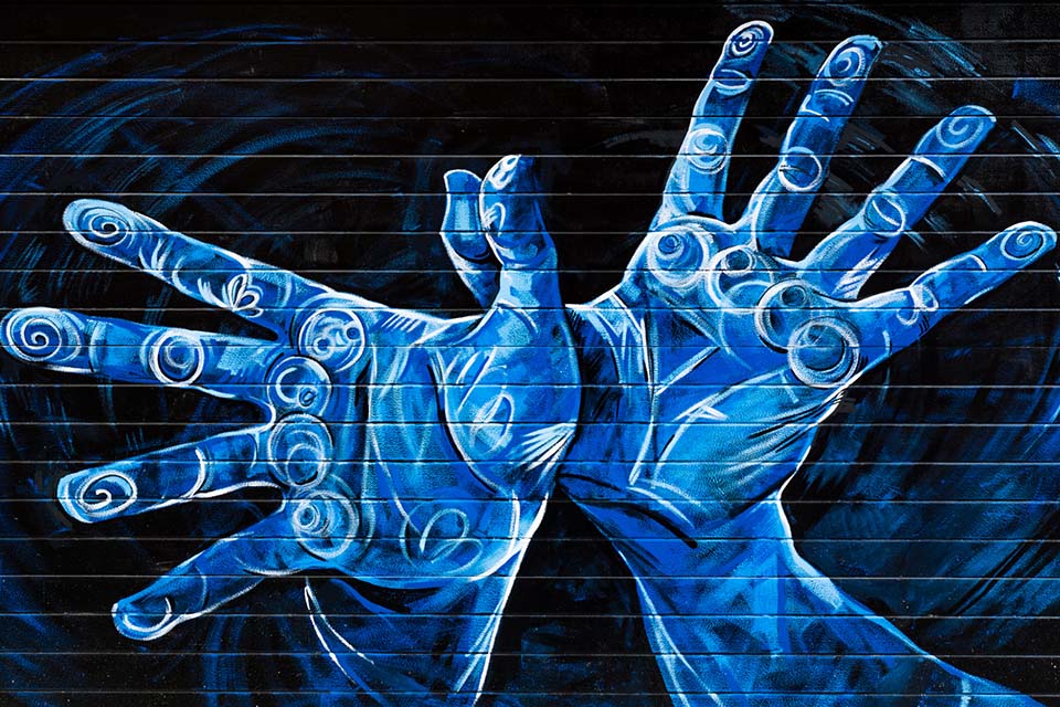 Blue hands with white lines