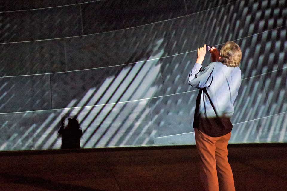 photographer in a digital exhibition