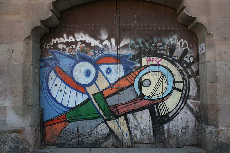door decorated with graffiti in barcelona