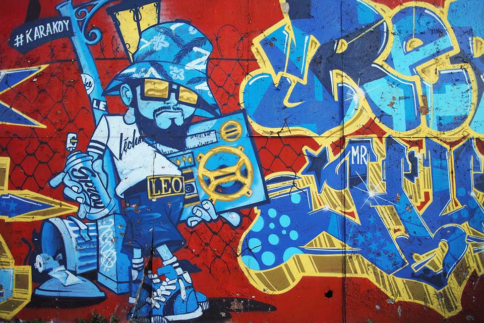 is a graffiti mural considered art or vandalism?