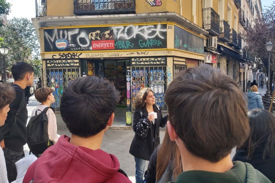 Christine explaining pixel art during an educational trip in Madrid 