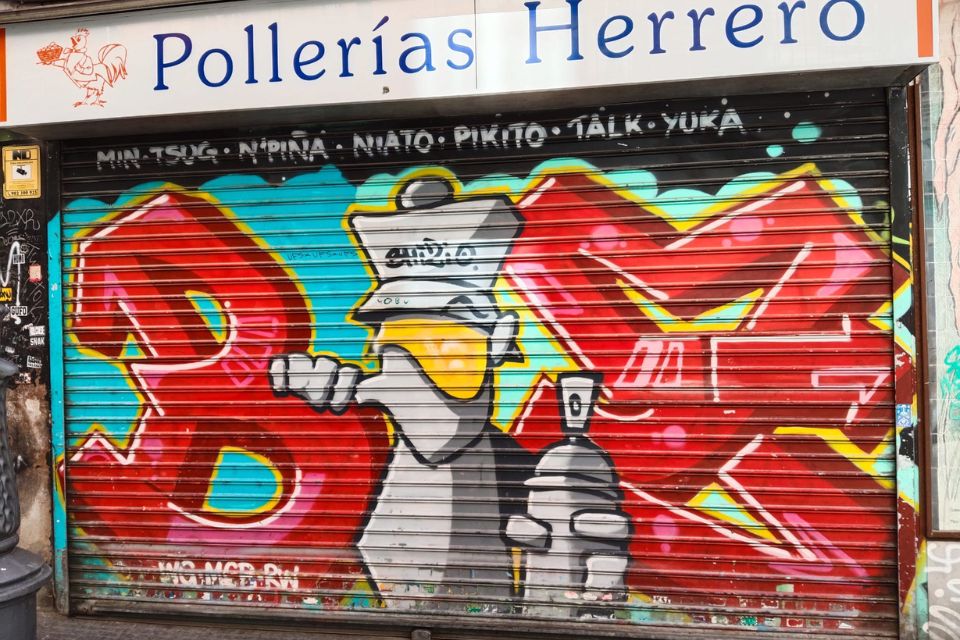 Painted shutters of a chicken rottiserie in Malasaña 